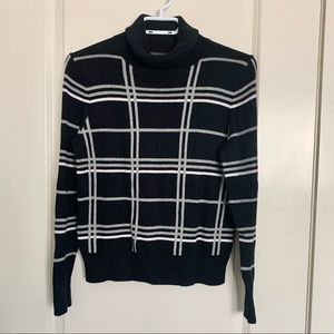 Black turtle neck sweater